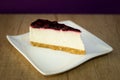 Cheese cake on white dish with fruit Royalty Free Stock Photo