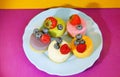 Cheese cakes with berries on colourful background. Restaurant menu. Food art. Colourful dish. Sweet meal.