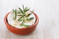 Cheese camembert with nuts and rosemary in ceramic dish Royalty Free Stock Photo