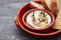 Cheese camembert with nuts and rosemary in ceramic dish Royalty Free Stock Photo