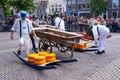 Cheese carriers at the market