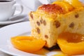 Cheese casserole with raisins and peaches closeup Royalty Free Stock Photo