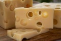 Cheese collection, french hard cheese with holes emmentaler close up