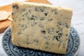 Cheese collection, English semi-soft, crumbly old stilton blue cheese close up