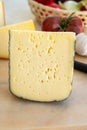 Cheese collection, French fol epi  cheese with many little holes, etorki, tomme noire des pyrenees and ossau iraty cheese Royalty Free Stock Photo