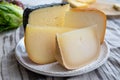 Cheese collection, French fol epi  cheese with many little holes, etorki, tomme noire des pyrenees and ossau iraty cheese Royalty Free Stock Photo