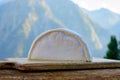 Cheese collection, French reblochon de savoie cheese served outdoor in Savoy region, with Alpine mountains peaks on background