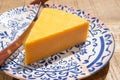 Cheese collection, piece of British yellow cheddar cheese made in Somerset from cow milk