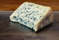 Cheese collection, piece of French blue cheese auvergne or fourme d`ambert Royalty Free Stock Photo