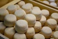 Cheese collection, soft goat French cheese with mold crottin de Chavignol produced near Sancerre, Loire Valley close up