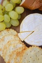 Cheese Crackers and bread on a wooden table Royalty Free Stock Photo