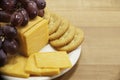 Cheese and Crackers with Grapes on Plate