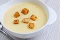 Cheese cream soup with snall toasts crutoons Royalty Free Stock Photo
