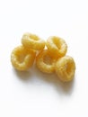 cheese crispy corn snacks on a white background, salted corn rings Royalty Free Stock Photo