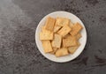 Cheese flavor crostini crackers on a white plate Royalty Free Stock Photo