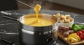 Cheese Fondue with Bread, Meat and Vegetables Royalty Free Stock Photo