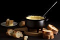 Cheese fondue dish with fork. Generate ai Royalty Free Stock Photo