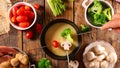 Cheese fondue with fresh vegetable- broccoli, tomato, potato