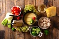 Cheese fondue with fresh vegetable- broccoli, tomato, potato