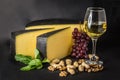 Cheese with Grape, White Wine, Peanuts and Mint Royalty Free Stock Photo