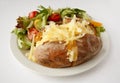 Cheese Jacket Potato with side salad Royalty Free Stock Photo