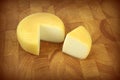 Cheese on kitchen board Royalty Free Stock Photo