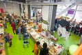 Cheese market full of people on one of the Flacon Design Factory pavilion.