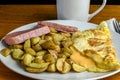 cheese omelet with spam and a side of home fries