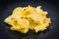 Cheese and Onion Potato Chips on a slate slab selective focus