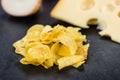 Cheese and Onion Potato Chips on a slate slab selective focus