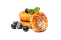 Cheese pancakes, blueberry and mint isolated on background