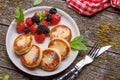 Cheese pancakes with fresh berries