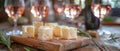 Cheese Pieces on Wooden Cutting Board