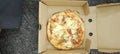 Cheese pizza in a box ready to eat Royalty Free Stock Photo