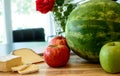 Cheese plate with Apples in kitchen Royalty Free Stock Photo