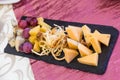 Cheese plate at the Banquet in the restaurant. Delicacies and snacks at the buffet Royalty Free Stock Photo