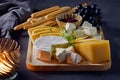 cheese plate and bread sticks Royalty Free Stock Photo