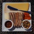 Cheese plate with crackers and nuts Royalty Free Stock Photo