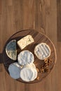 Cheese plate. different cheeses on a wooden plate Royalty Free Stock Photo