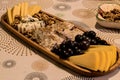 Cheese plate: Emmental, Camembert cheese, blue cheese, cheddar, grape, walnuts