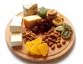 Cheese plate. healthy food. Blue cheese. Hard cheese. fruit and nuts