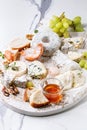 Cheese plate with honey Royalty Free Stock Photo