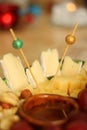 Cheese plate with nuts, grapes and mead Royalty Free Stock Photo