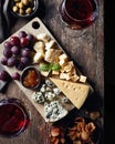 Cheese plate and red wine Royalty Free Stock Photo