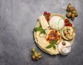 Cheese plate. A set of cheeses. Halumi, cheese sticks, Suluguni, Camembert,  fresh soft white burrata cheese ball, mozzarella Royalty Free Stock Photo