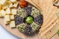 Cheese plate variation on a wooden table Royalty Free Stock Photo