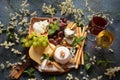 Cheese platter with assorted cheeses, grapes, nuts and snacks Royalty Free Stock Photo