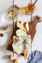 Cheese platter with blue cheese and pear. Wine snack. Italian cuisine. Vegetarian food. Healthy eating