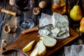 Cheese platter with blue cheese and pear. Wine snack. Italian cuisine. Vegetarian food. Healthy eating