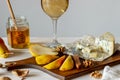 Cheese platter with blue cheese and pear. Wine snack. Italian cuisine. Vegetarian food. Healthy eating